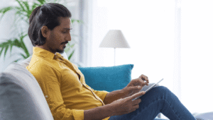 A man looking concerned about The 6th Anti-Money Laundering Directive (6AMLD) – a header image